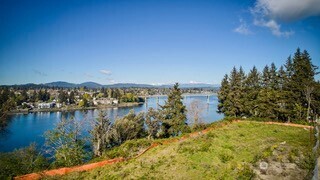 1943 Wheaton Way Bremerton, WA 98310 - Photo 10 of 10 a view of a lake with a city