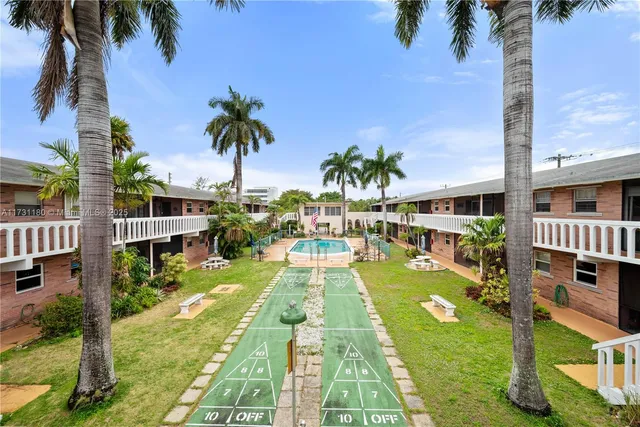 a view of a swimming pool with a garden