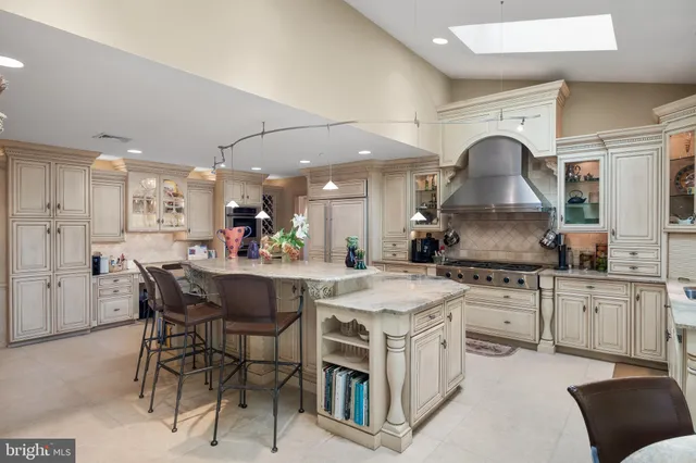 a kitchen with a stove oven and sink