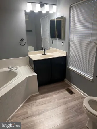 a view of a bathtub in a bathroom