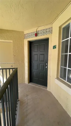 a view of a entrance door of the house