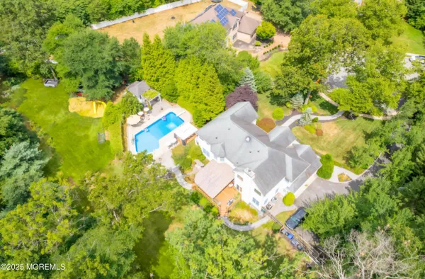 a kitchen with a refrigerator a stove a microwave and cabinets