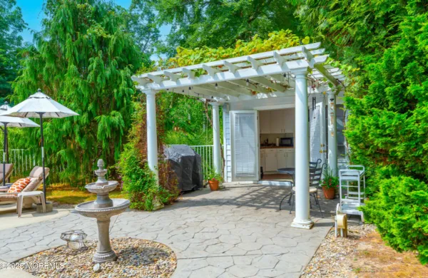 a view of a swimming pool with a sitting space