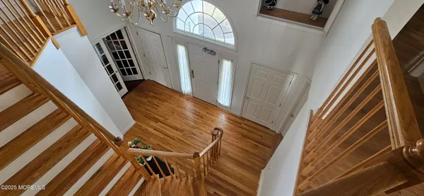 a view of a room with rack and toys