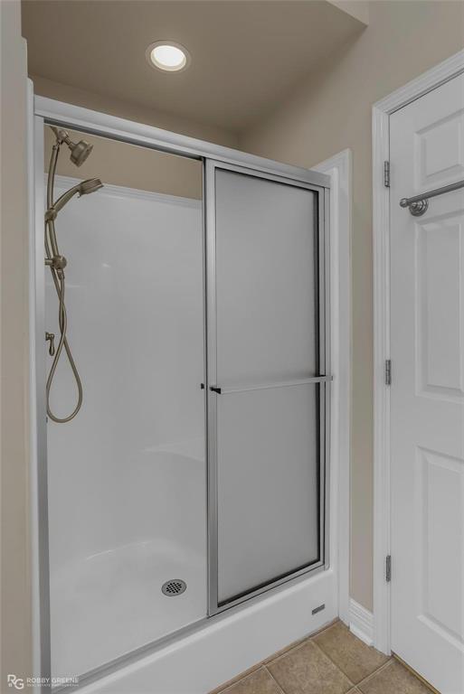 2186 Stockwell Road Bossier City, LA 71111 - Photo 18 of 40 Bathroom with a stall shower, light tile patterned floors, and recessed lighting
