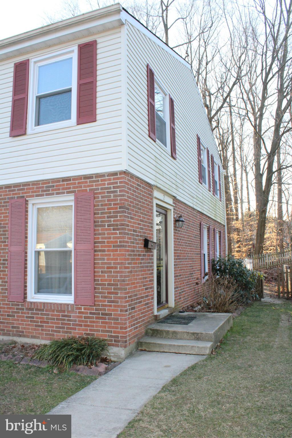 2 Rothamel Court Baltimore, MD 21236 - Photo 3 of 22 a front view of a house with garden