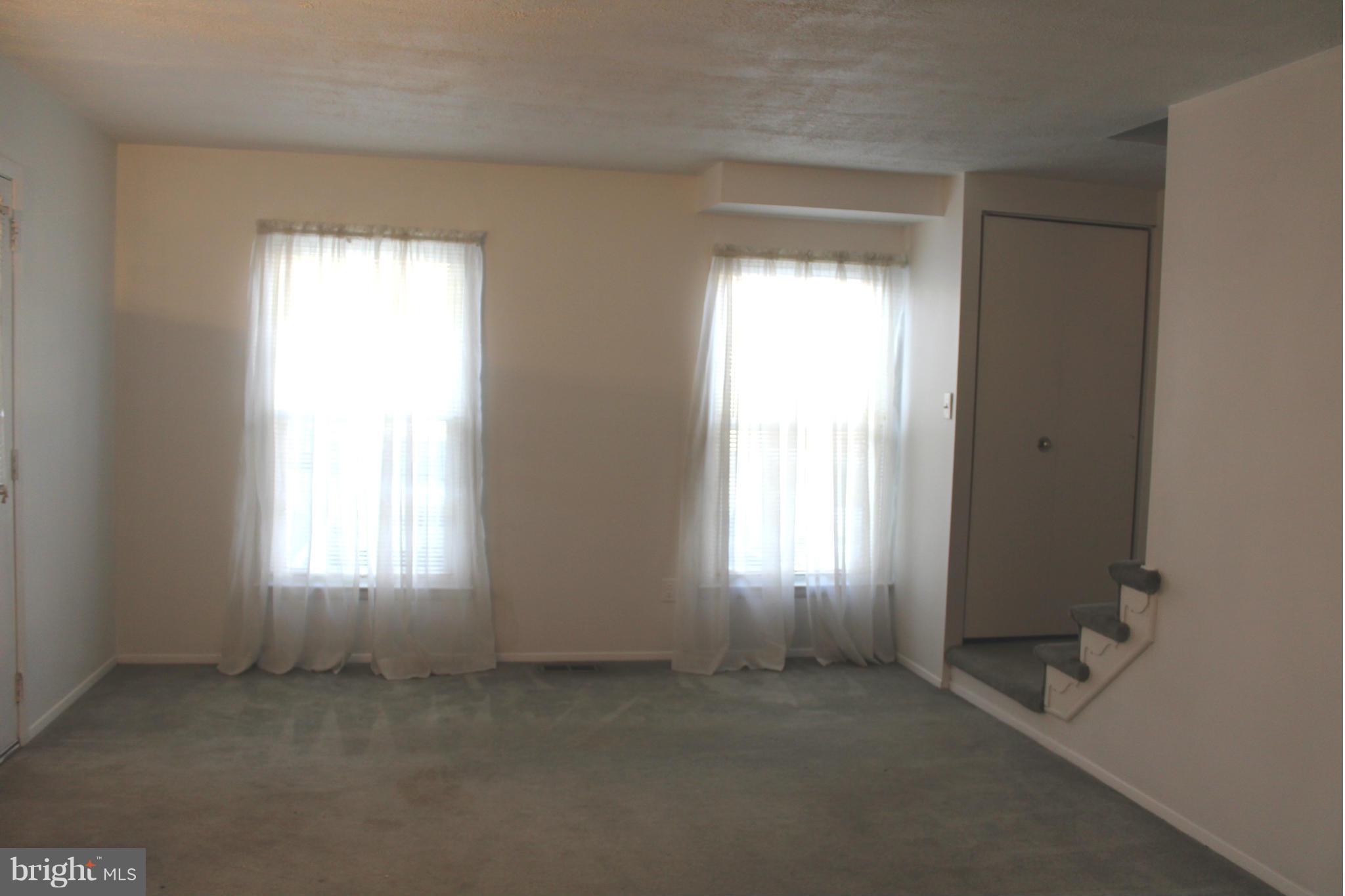 2 Rothamel Court Baltimore, MD 21236 - Photo 4 of 22 an empty room that has a window