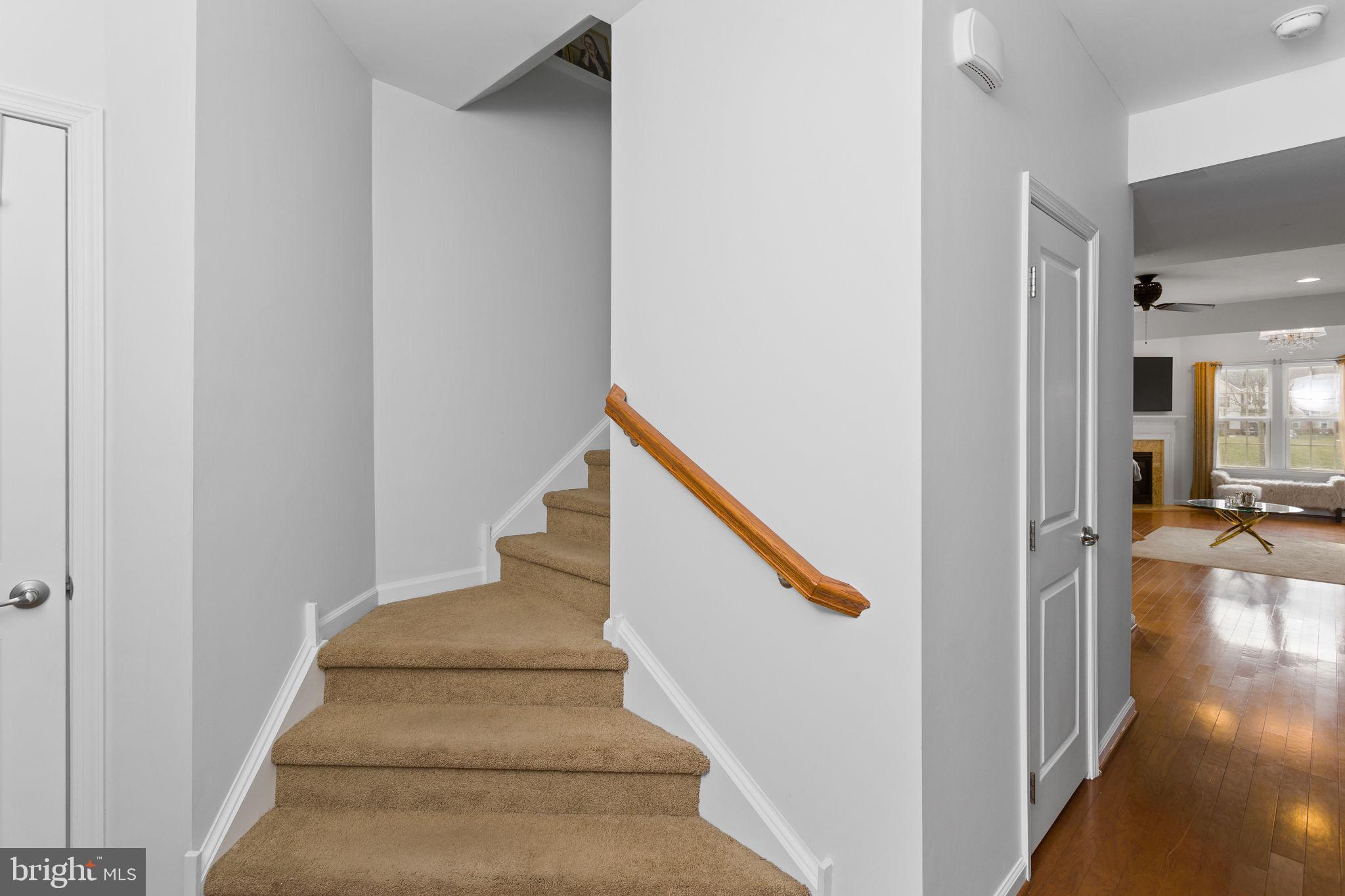 21 Sundance Drive Hamilton, NJ 08619 - Photo 16 of 30 Inviting staircase leads to upper living spaces.