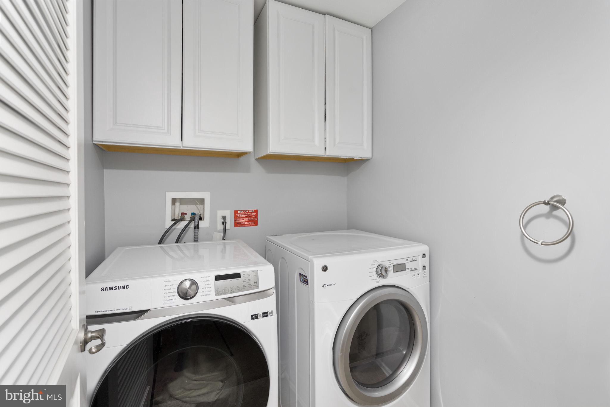 21 Sundance Drive Hamilton, NJ 08619 - Photo 18 of 30 Modern laundry space with sleek appliances.