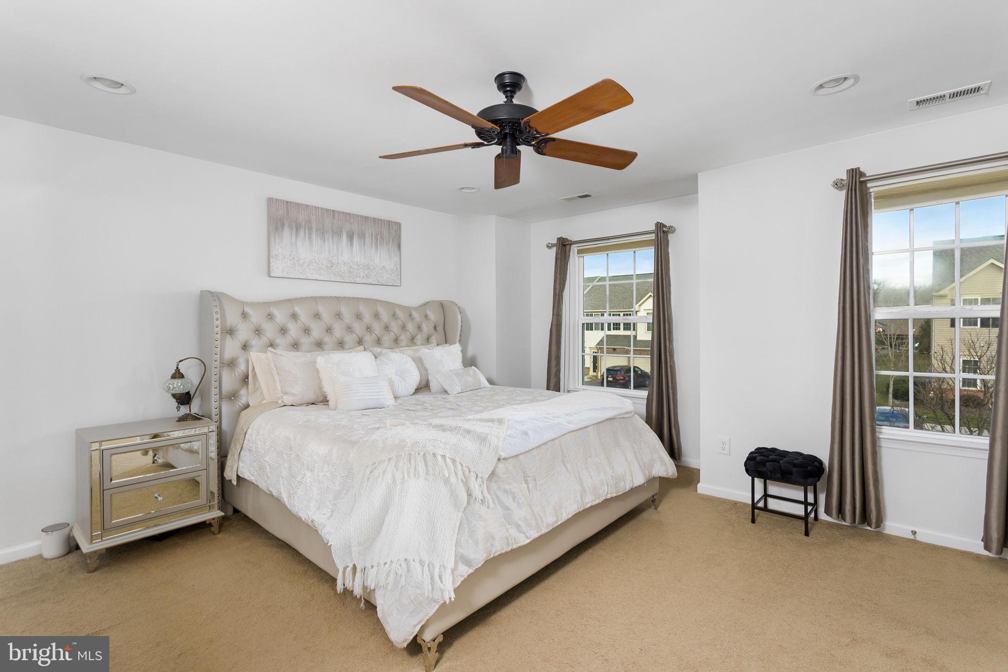 21 Sundance Drive Hamilton, NJ 08619 - Photo 19 of 30 Serene bedroom with natural light and elegance.