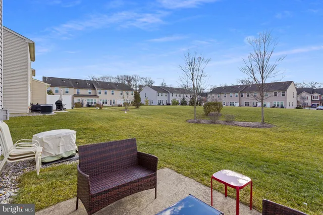 a view of a house with a big yard
