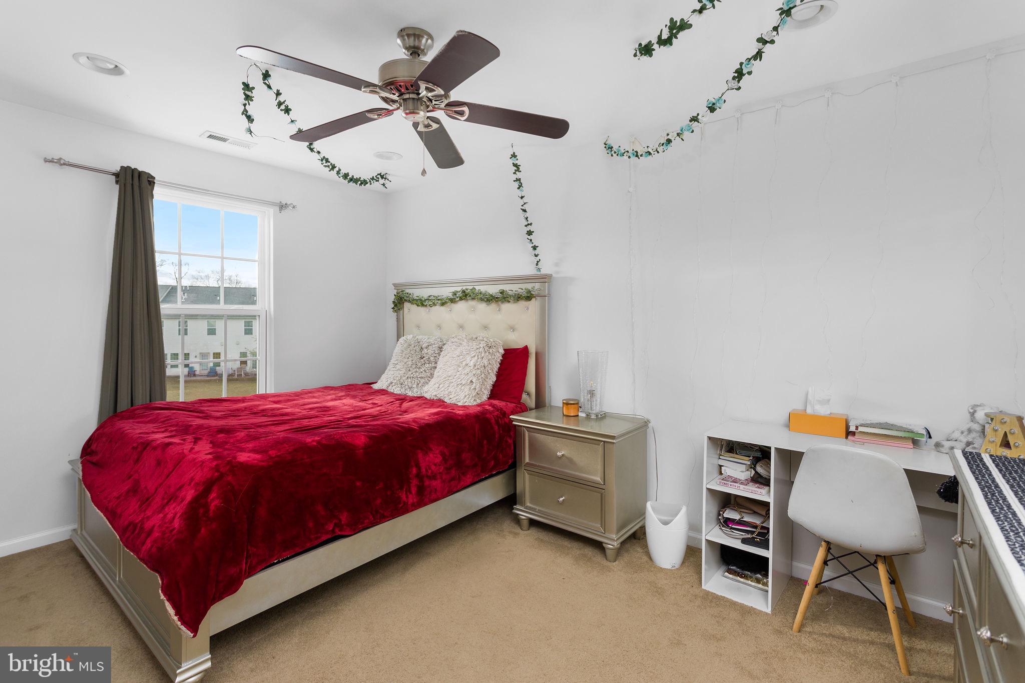 21 Sundance Drive Hamilton, NJ 08619 - Photo 26 of 30 Cozy bedroom with vibrant red accents.