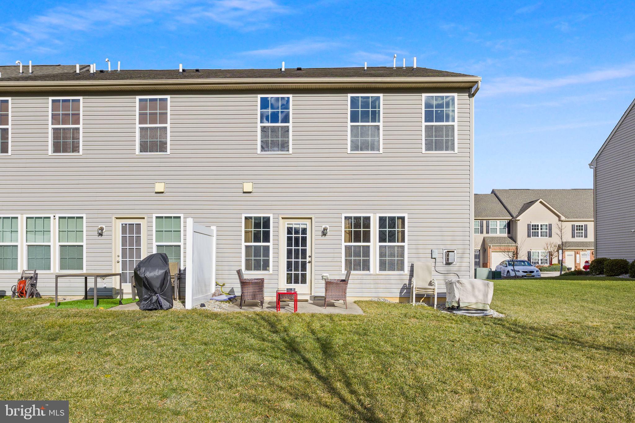 21 Sundance Drive Hamilton, NJ 08619 - Photo 27 of 29 a front view of a house with a yard