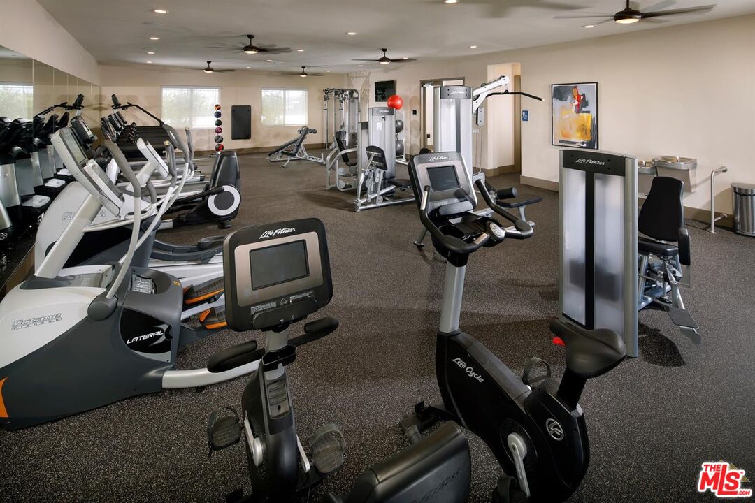 3709 Parterre Court Bakersfield, CA 93311 - Photo 14 of 30 a view of a room with gym equipment