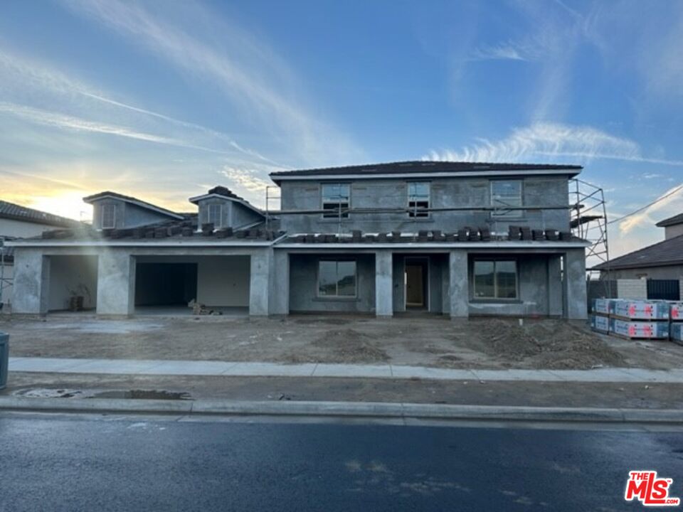 3709 Parterre Court Bakersfield, CA 93311 - Photo 2 of 30 a view of a house with a fireplace and a flat tv screen