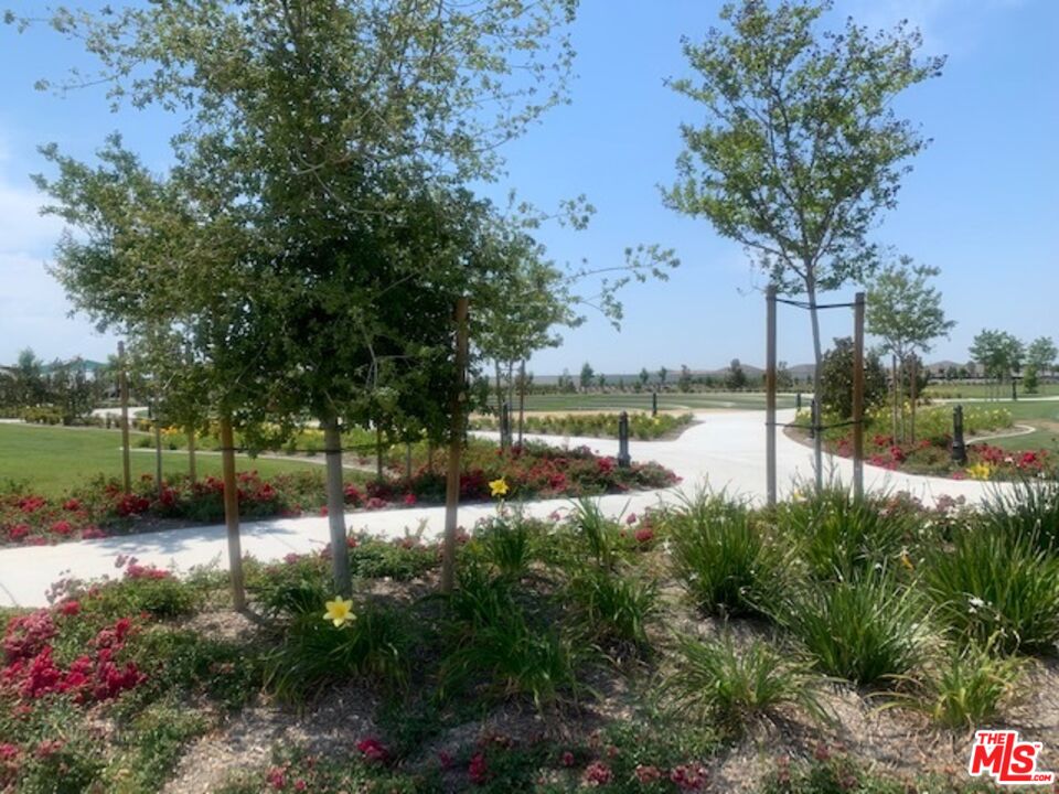 3709 Parterre Court Bakersfield, CA 93311 - Photo 26 of 30 a view of a lake with houses in back
