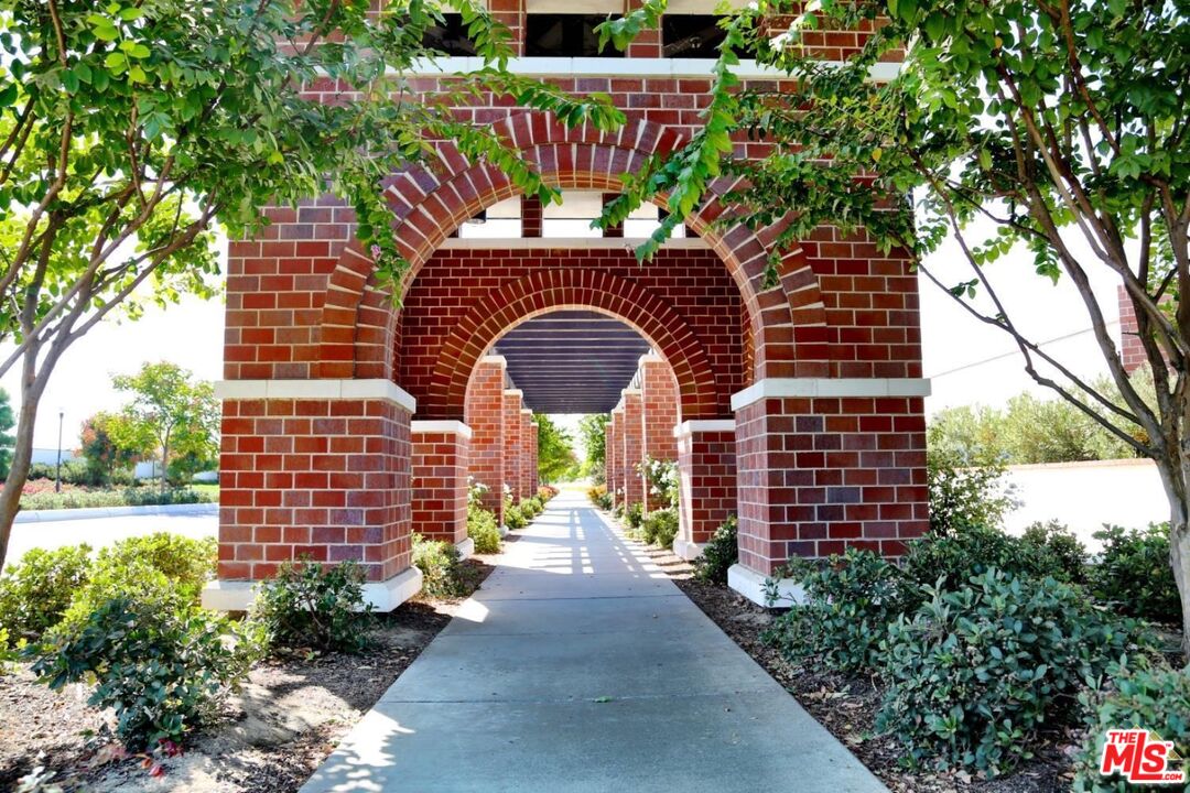 3709 Parterre Court Bakersfield, CA 93311 - Photo 7 of 30 a front view of a house with a garden