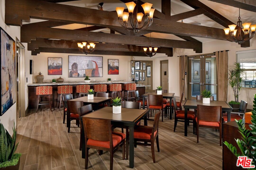 3709 Parterre Court Bakersfield, CA 93311 - Photo 9 of 30 a view of a dining room with furniture window and wooden floor