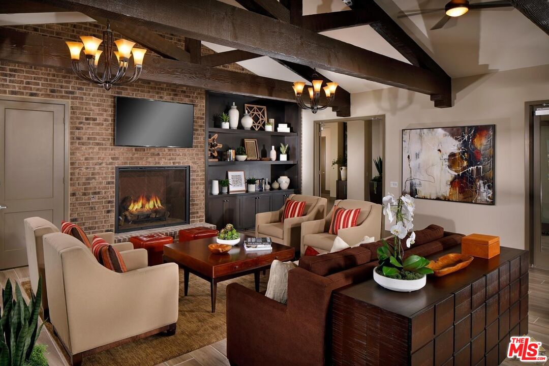 3709 Parterre Court Bakersfield, CA 93311 - Photo 10 of 30 a living room with furniture and a fireplace