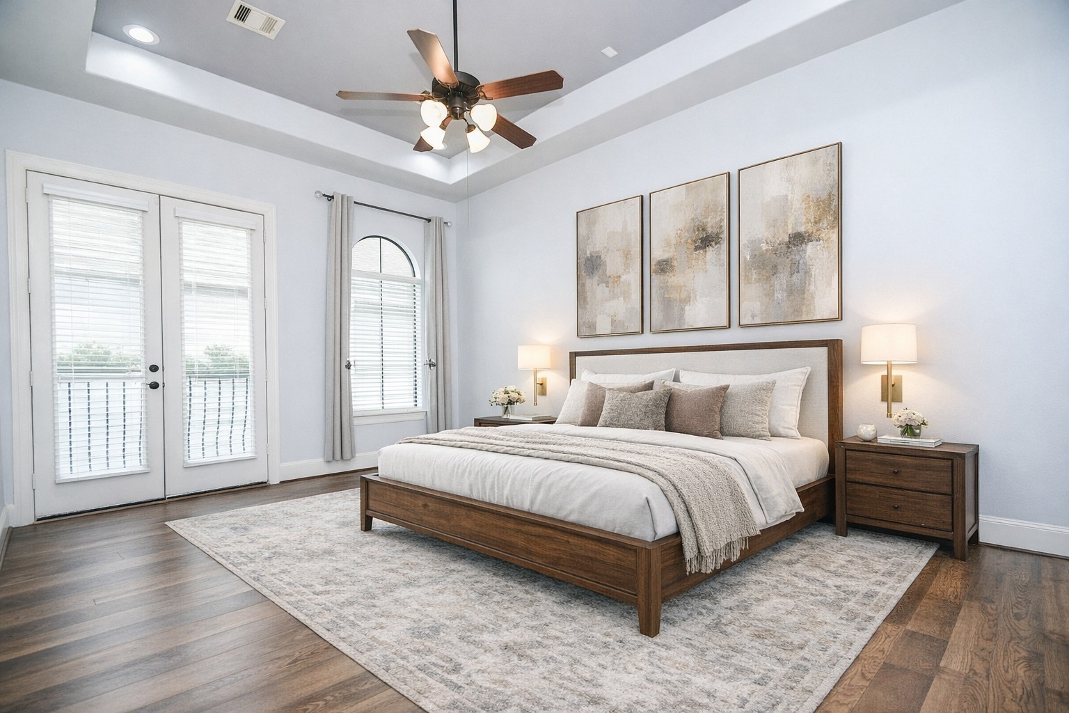 1222 West 17th Street, Unit D Houston, TX 77008 - Photo 17 of 38 a spacious bedroom with a large bed and a chandelier