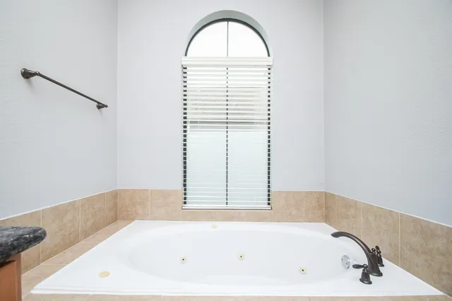 a bathroom with a bathtub