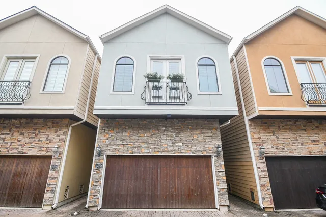 a front view of a house with windows