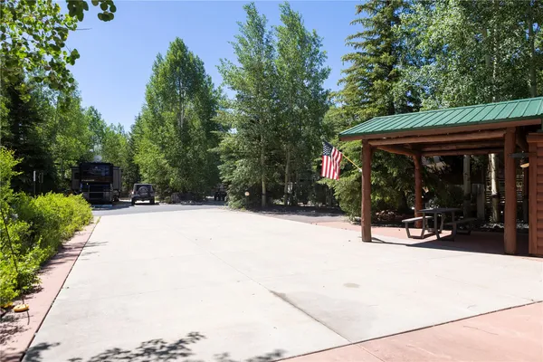 a view of house with outdoor space and porch