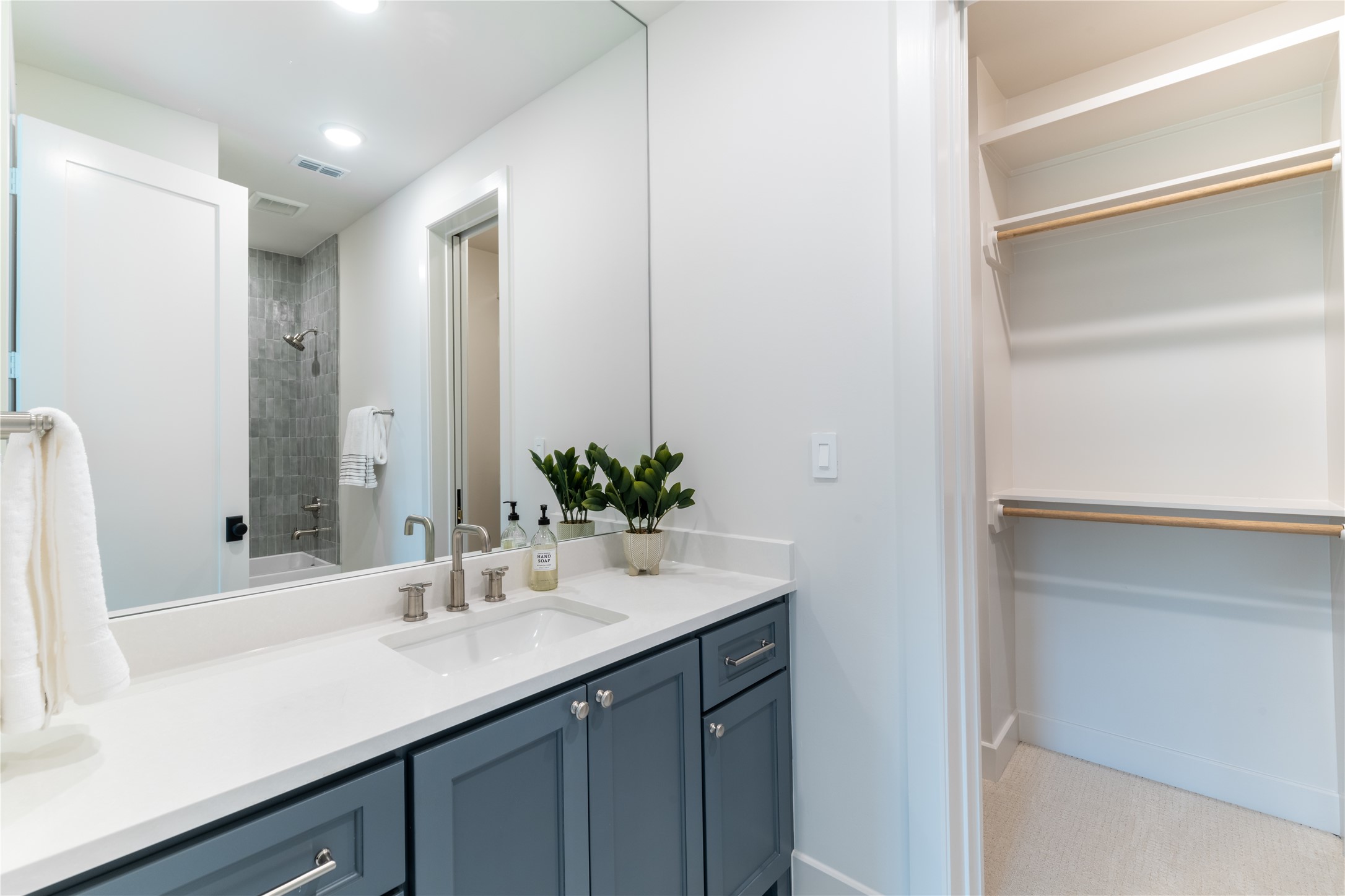 24710 Lake Kent Lane Spring, TX 77389 - Photo 30 of 33 a bathroom with a sink and a mirror