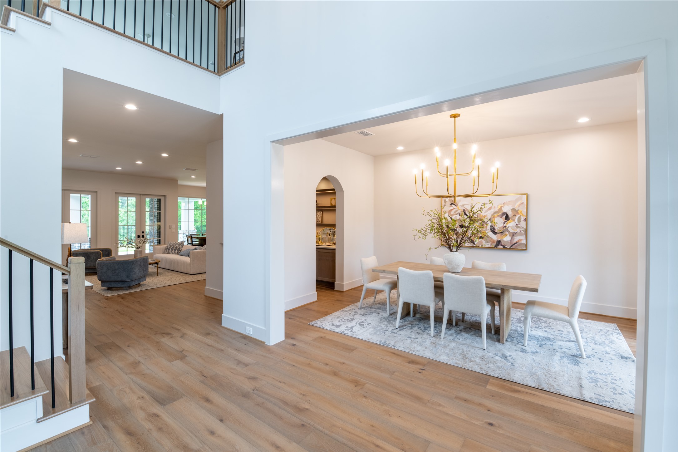 24710 Lake Kent Lane Spring, TX 77389 - Photo 3 of 33 a view of a dining room with furniture and wooden floor