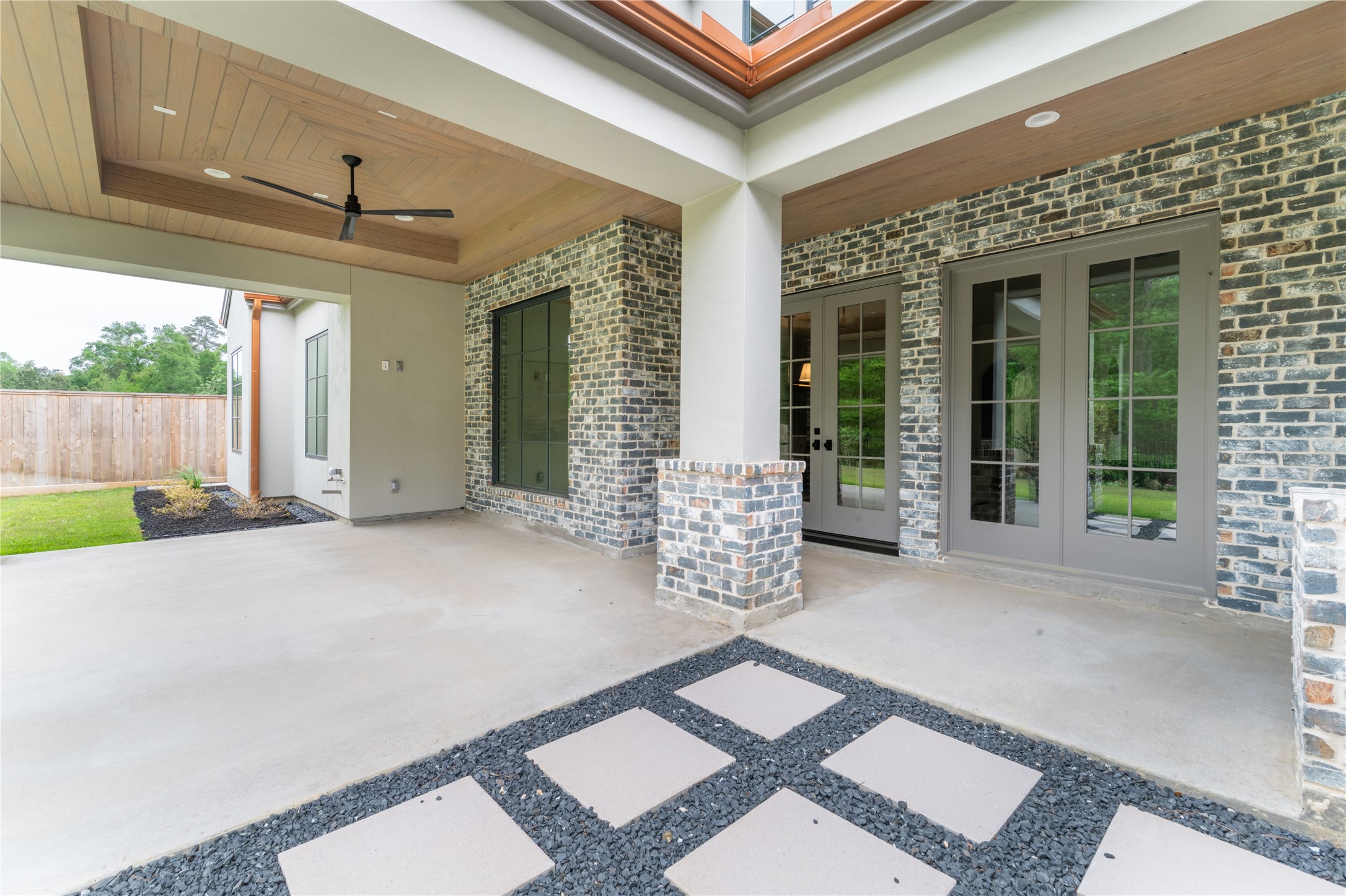 24710 Lake Kent Lane Spring, TX 77389 - Photo 31 of 33 a view of a patio with table and chairs and potted plants