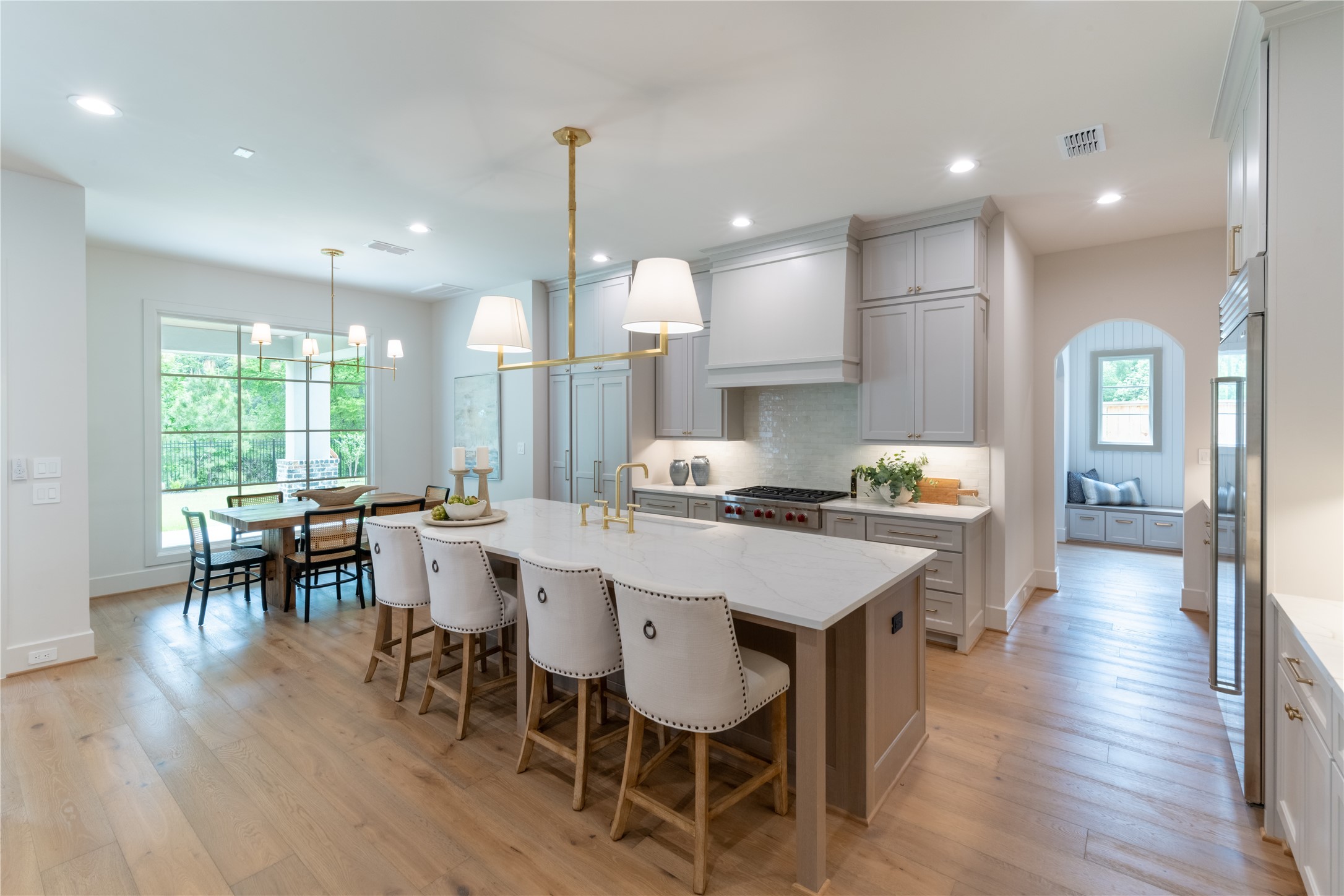24710 Lake Kent Lane Spring, TX 77389 - Photo 7 of 33 a large kitchen with a table and chairs