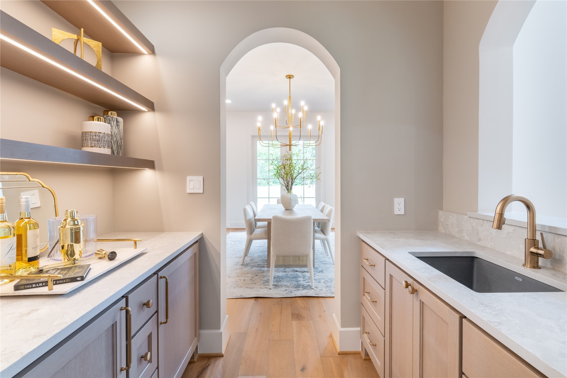24710 Lake Kent Lane Spring, TX 77389 - Photo 9 of 33 a kitchen with a sink a stove and cabinets
