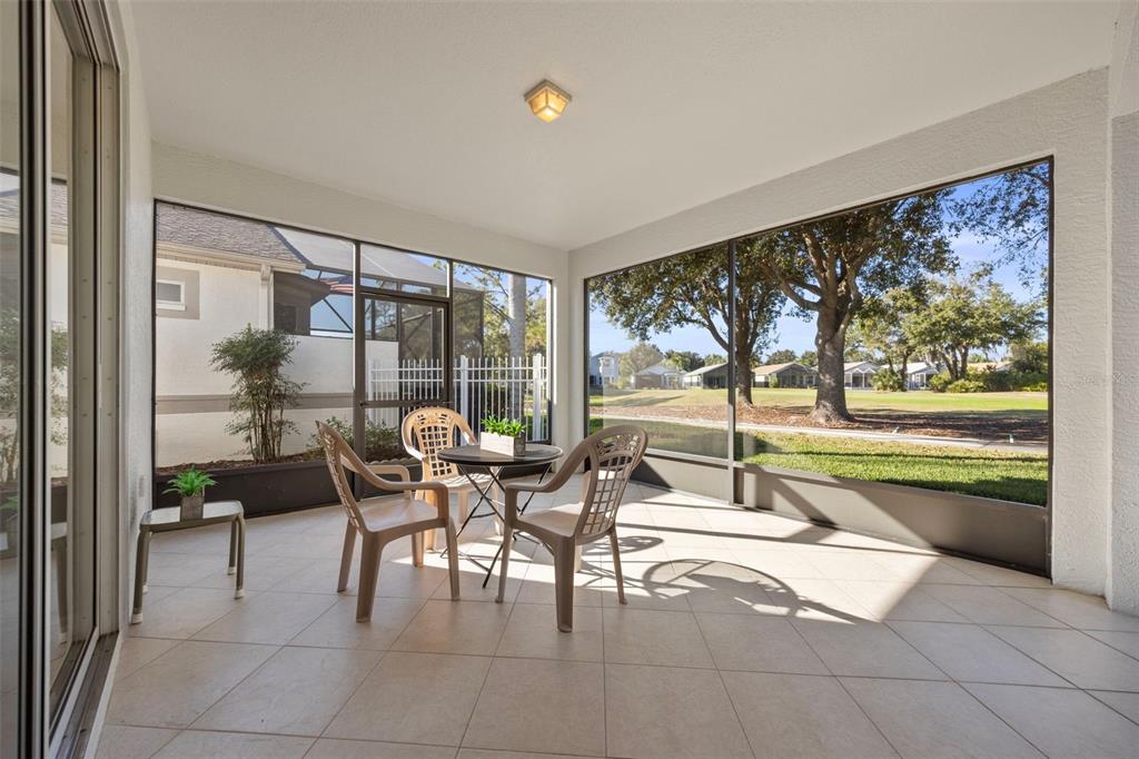 20907 Tangor Road Land O Lakes, FL 34637 - Photo 2 of 49 a dining room with furniture and large windows