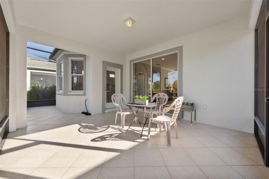 20907 Tangor Road Land O Lakes, FL 34637 - Photo 22 of 49 a view of a dining room with furniture