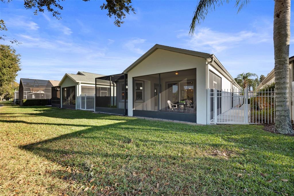 20907 Tangor Road Land O Lakes, FL 34637 - Photo 26 of 49 a view of a house with a big yard