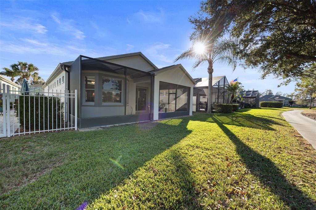 20907 Tangor Road Land O Lakes, FL 34637 - Photo 27 of 49 a view of a house with swimming pool and sitting area