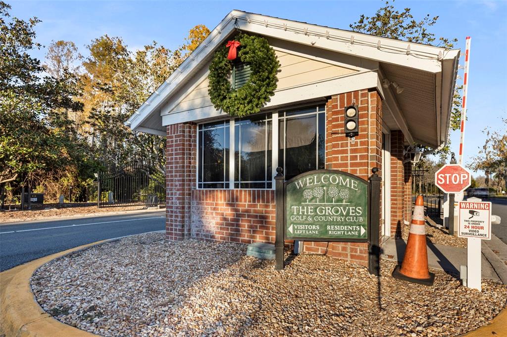 20907 Tangor Road Land O Lakes, FL 34637 - Photo 31 of 49 a front view of a house with garden