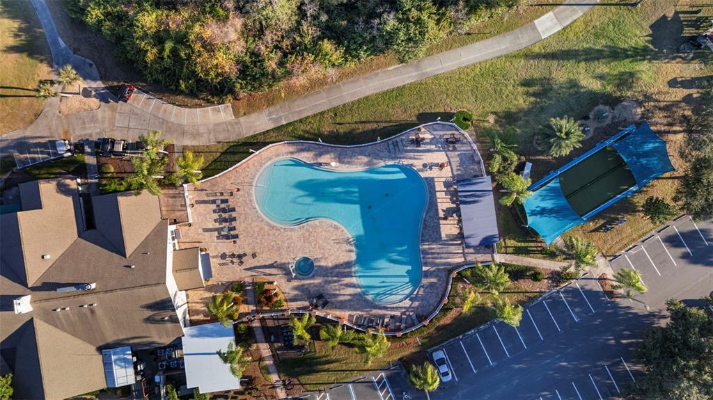 20907 Tangor Road Land O Lakes, FL 34637 - Photo 32 of 49 an aerial view of a house with a yard and a fountain