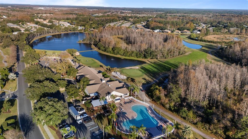 20907 Tangor Road Land O Lakes, FL 34637 - Photo 41 of 49 an aerial view of residential houses with outdoor space