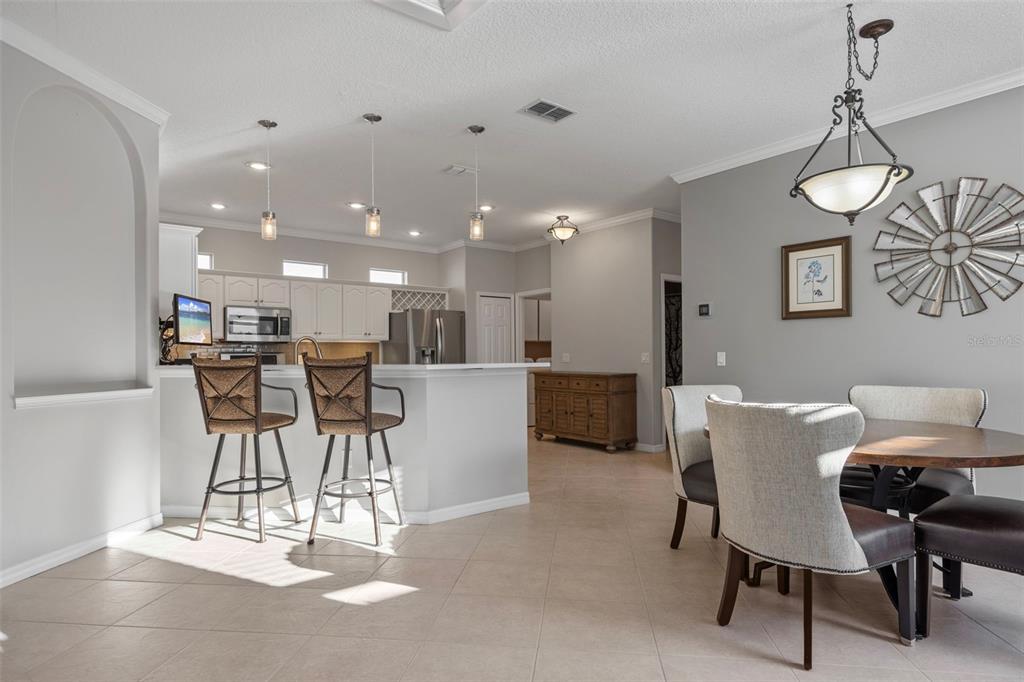 20907 Tangor Road Land O Lakes, FL 34637 - Photo 9 of 49 a view of a dining room with furniture