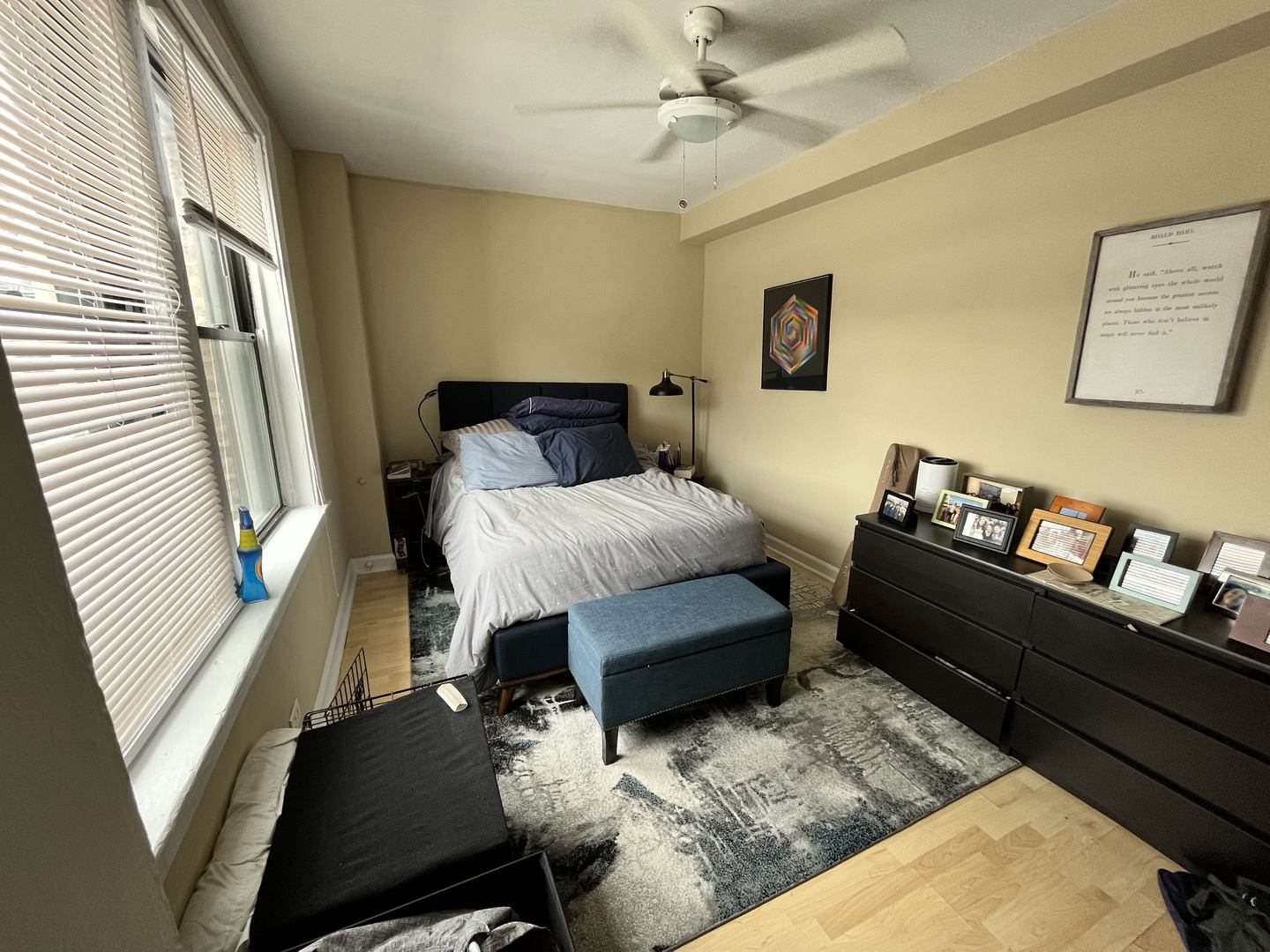 426 West Surf Street, Unit 618 Chicago, IL 60657 - Photo 6 of 11 a living room with furniture and wooden floor
