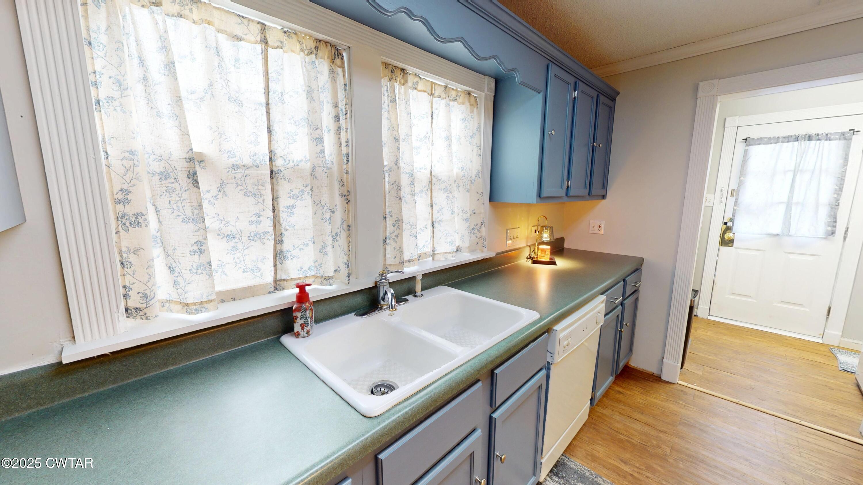 429 Church Street Ridgely, TN 38080 - Photo 11 of 35 a bathroom with a sink and a bathtub