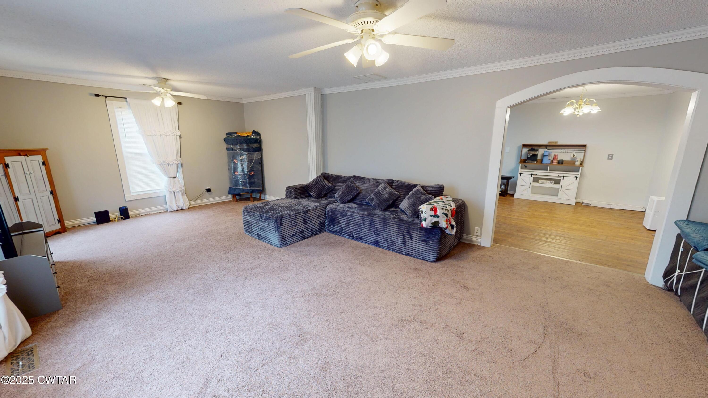 429 Church Street Ridgely, TN 38080 - Photo 2 of 35 a living room with furniture and a flat screen tv