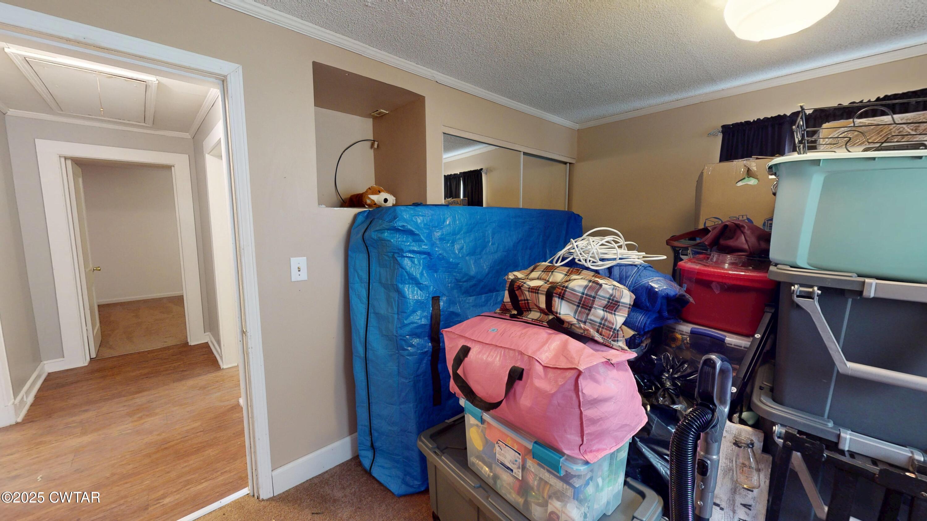 429 Church Street Ridgely, TN 38080 - Photo 24 of 35 a room with furniture and a flat screen tv