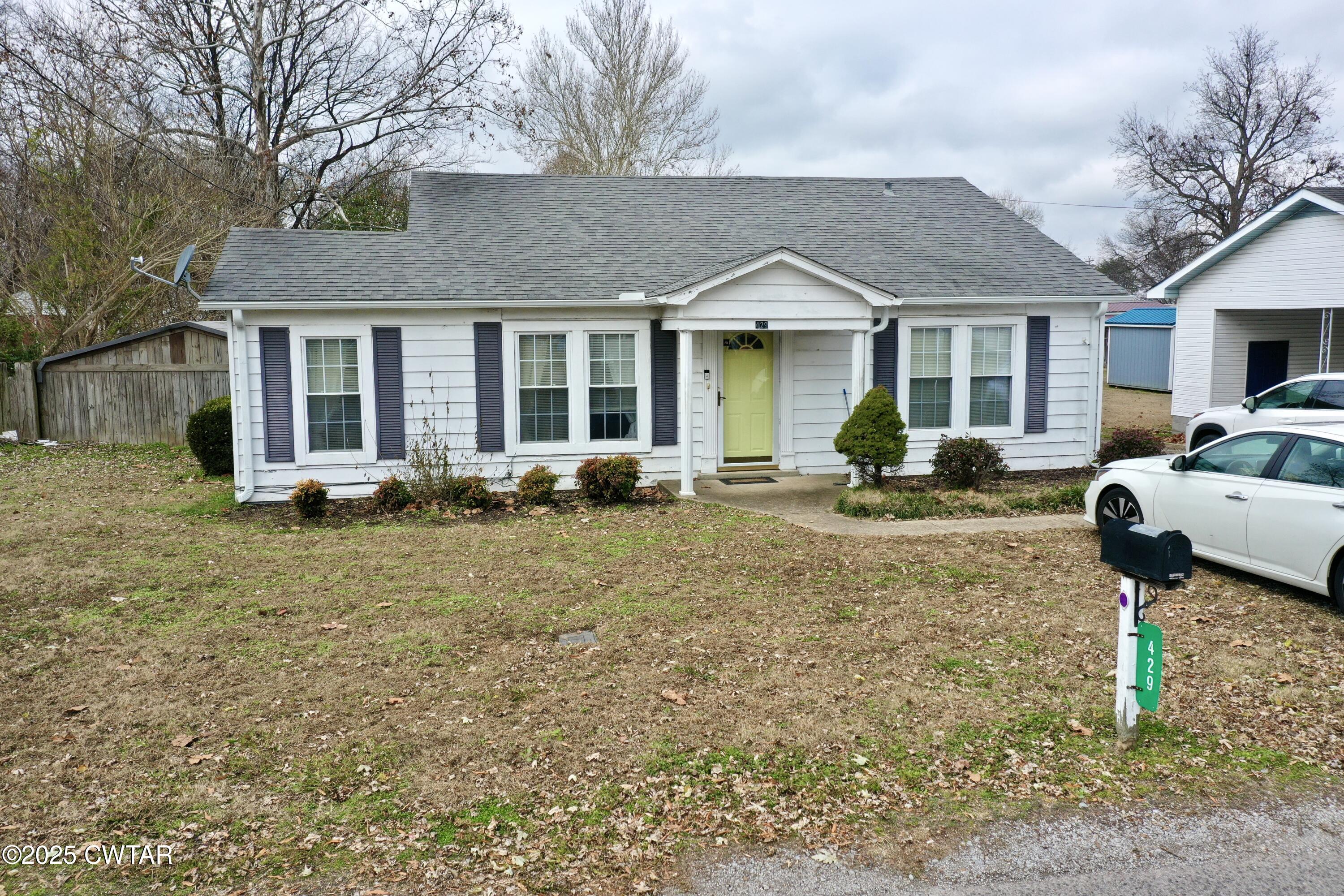429 Church Street Ridgely, TN 38080 - Photo 29 of 35 a front view of a house with garden