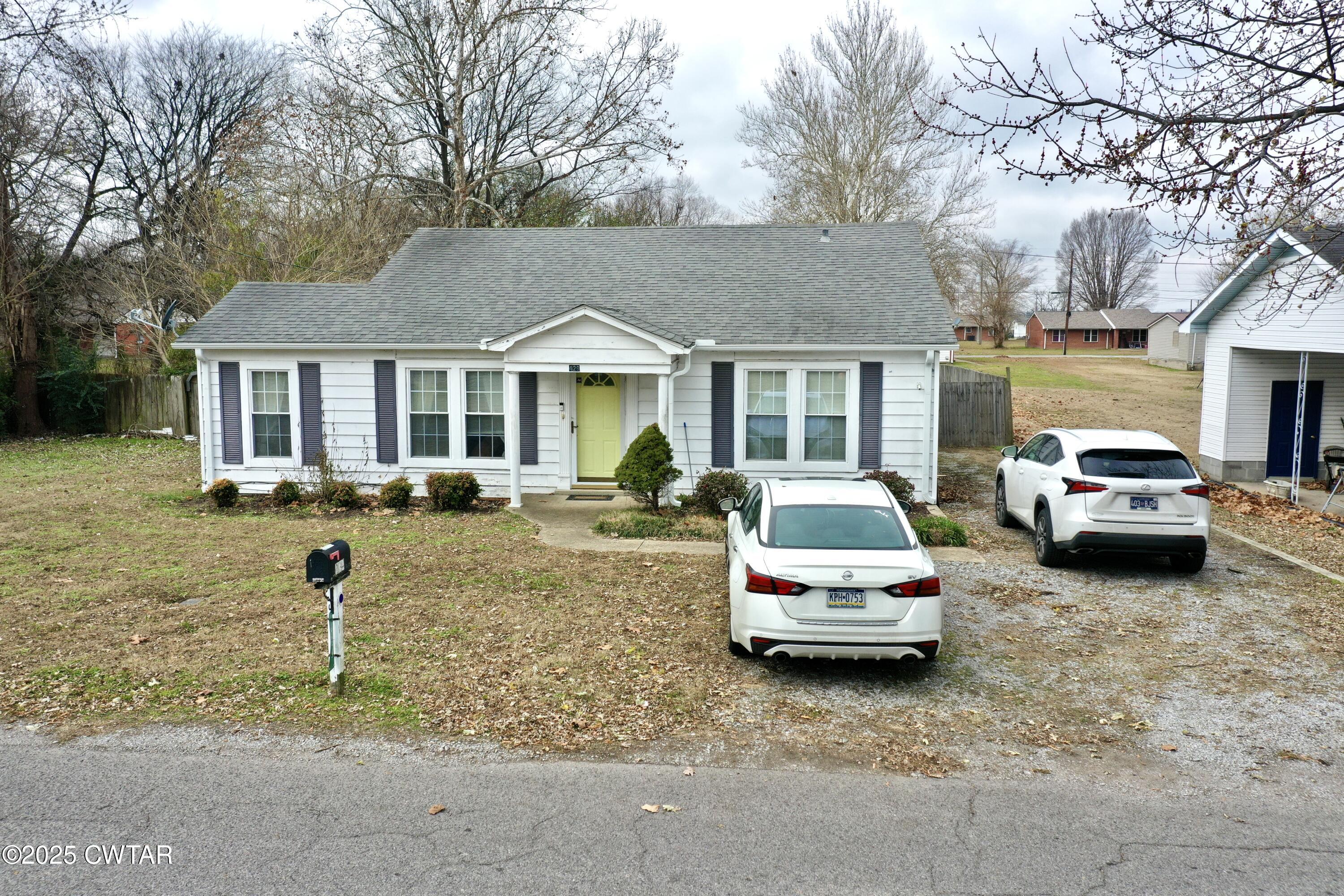 429 Church Street Ridgely, TN 38080 - Photo 30 of 35 a view of a car parked in front of a house