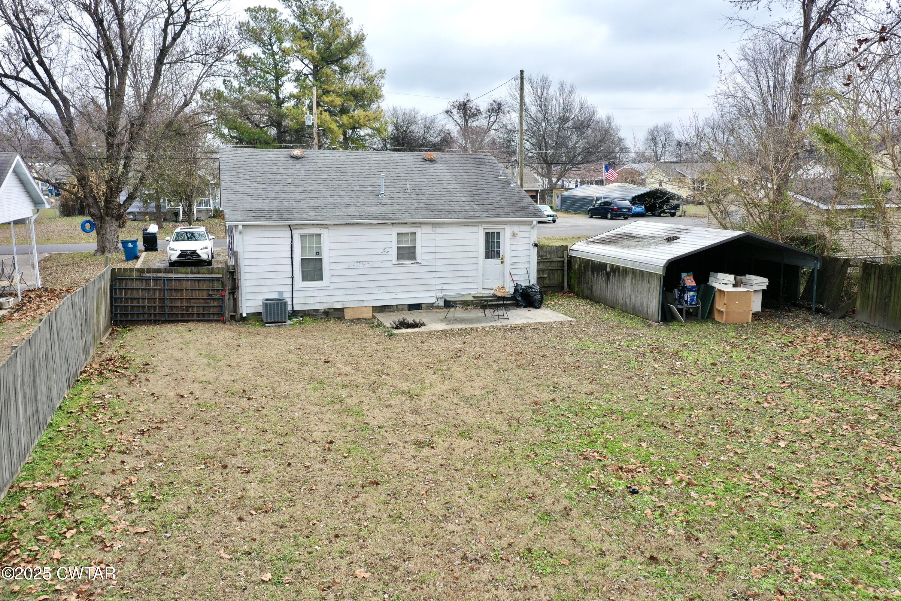 429 Church Street Ridgely, TN 38080 - Photo 31 of 35 a view of a house with backyard and sitting area