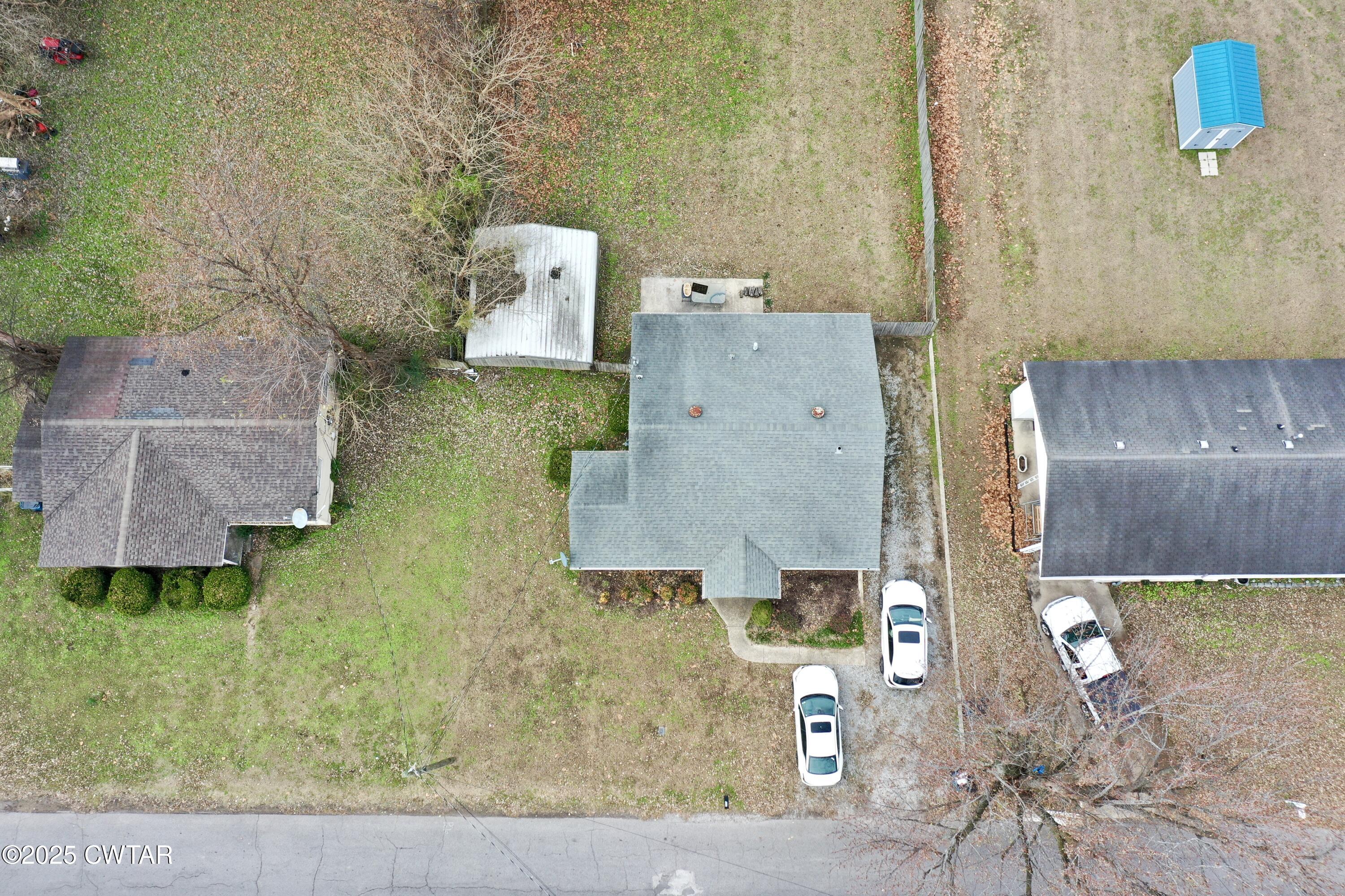 429 Church Street Ridgely, TN 38080 - Photo 35 of 35 an aerial view of residential houses with outdoor space