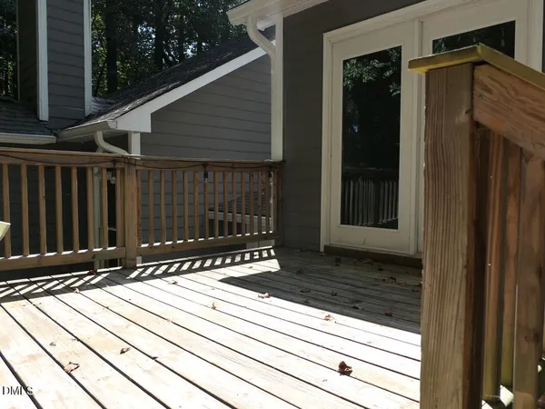 a view of backyard with small cabin
