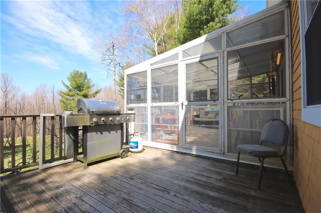 90 Tenny Hill Road Raymond, ME 04071 - Photo 19 of 35 Deck off the sunroom.